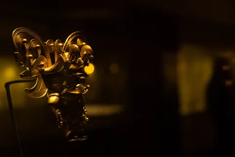 Gold Museum with a golden figure representing a small indigenous person wearing a crown.