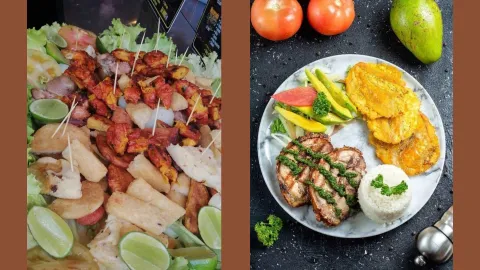  Plato de picada con chorizo, yucas, limón y papas. Y un plato al lado con patacón, arroz y dos trozos de carne. Hay un aguacate y dos tamales.