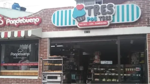 Local comercial con fachada en ladrillo donde sobresale un aviso con una leyenda que dice: "Tres Pos Tres".
