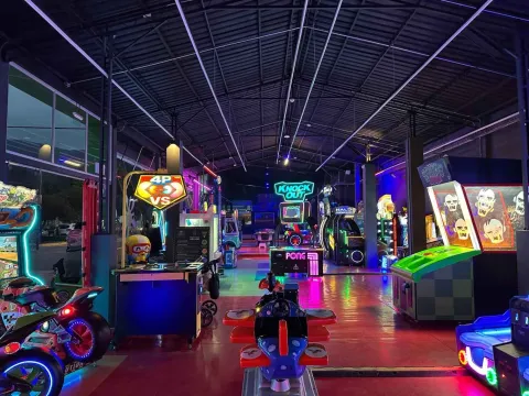 Several game machines in an amusement park.