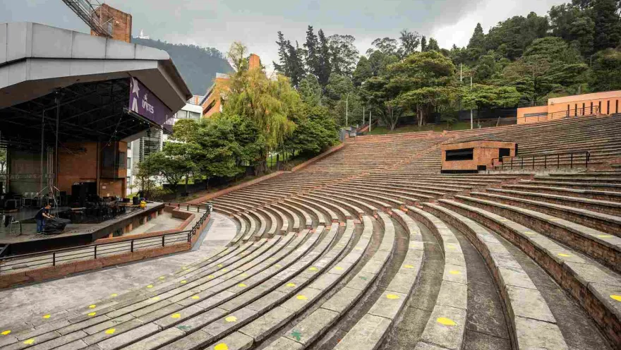 Side view of the stage and the first few rows of brick seating.