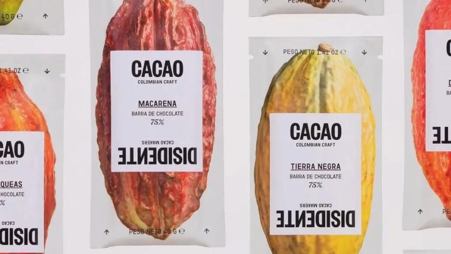 Colombian cacao products presented in corn-shaped packaging with different chocolate percentages.