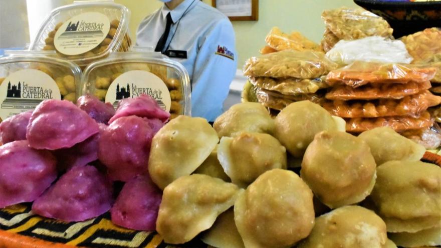 Variety of traditional Colombian sweets and desserts displayed at La Puerta de la Catedral.